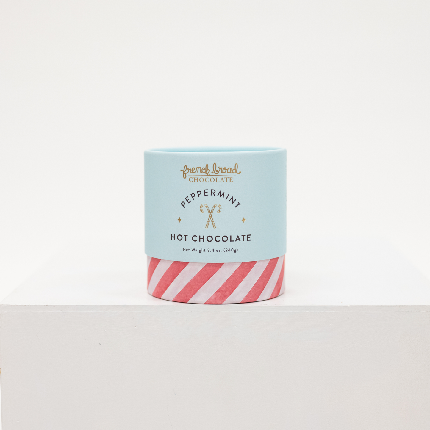 peppermint hot chocolate powder in a cardboard tube