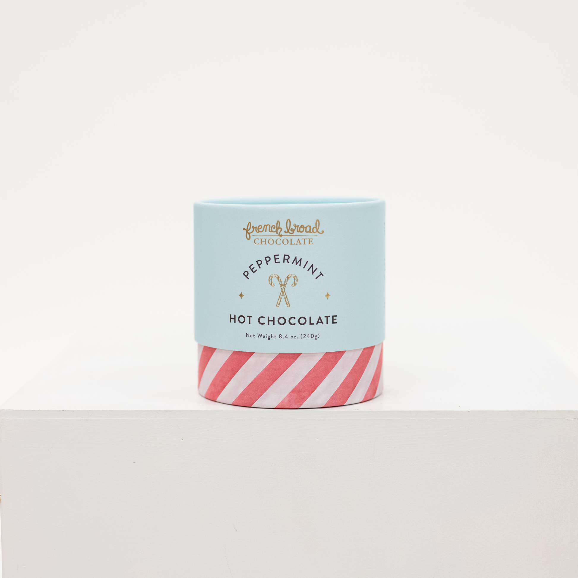 peppermint hot chocolate powder in a cardboard tube