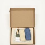 Punch needle kit with two colored threads and canvas
