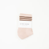 Light pink shorter crew girlfriend sock.