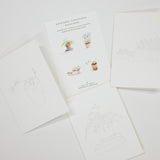 A set of white notecards or printouts laid out on a light background, including one central card titled 'paintable watercolor watercolor' with small plant illustrations and several surrounding cards with minimalist line drawings of potted plants.