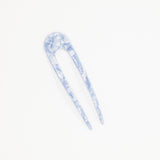 A marble pattern in a powder blue color for a french style hairpin.