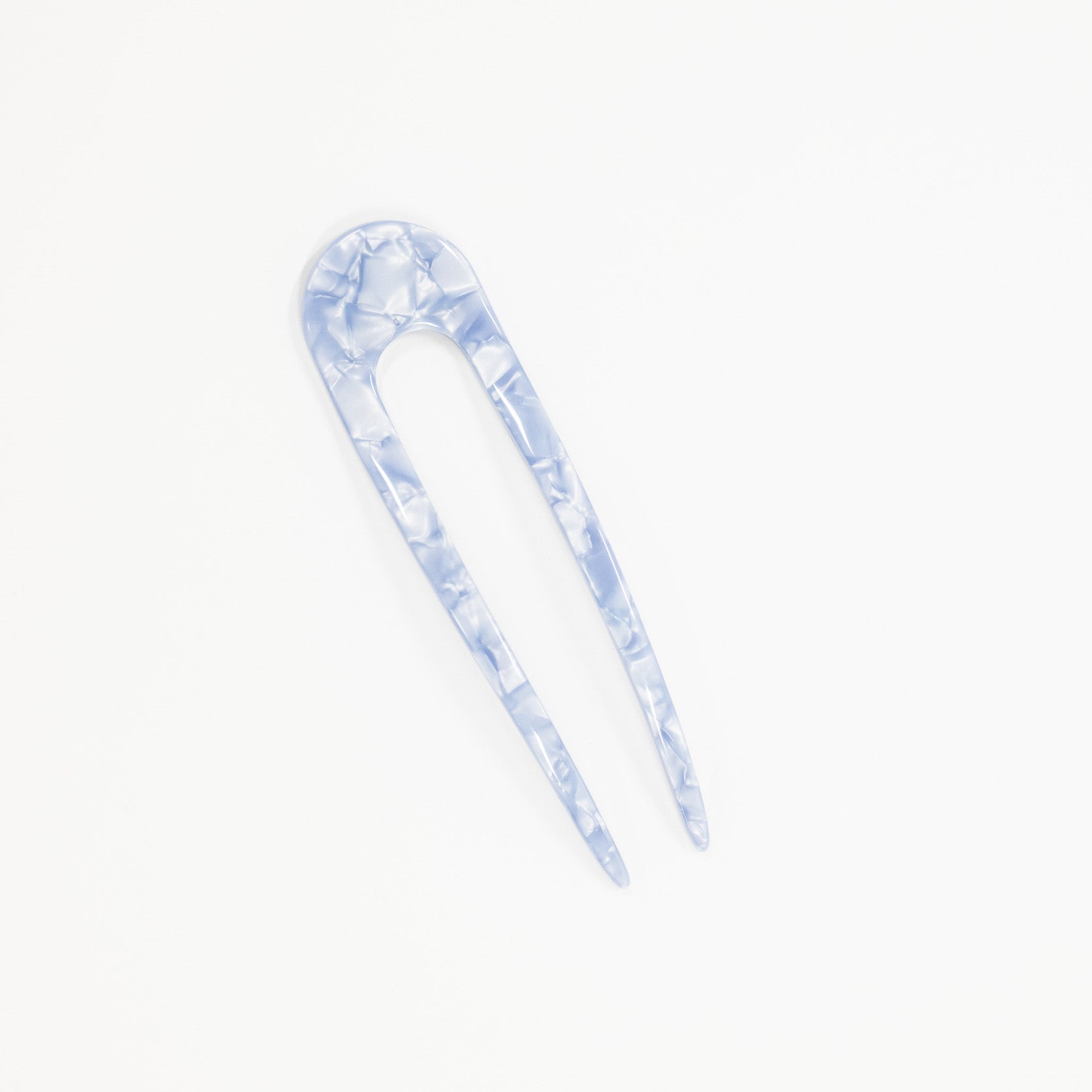 A marble pattern in a powder blue color for a french style hairpin.