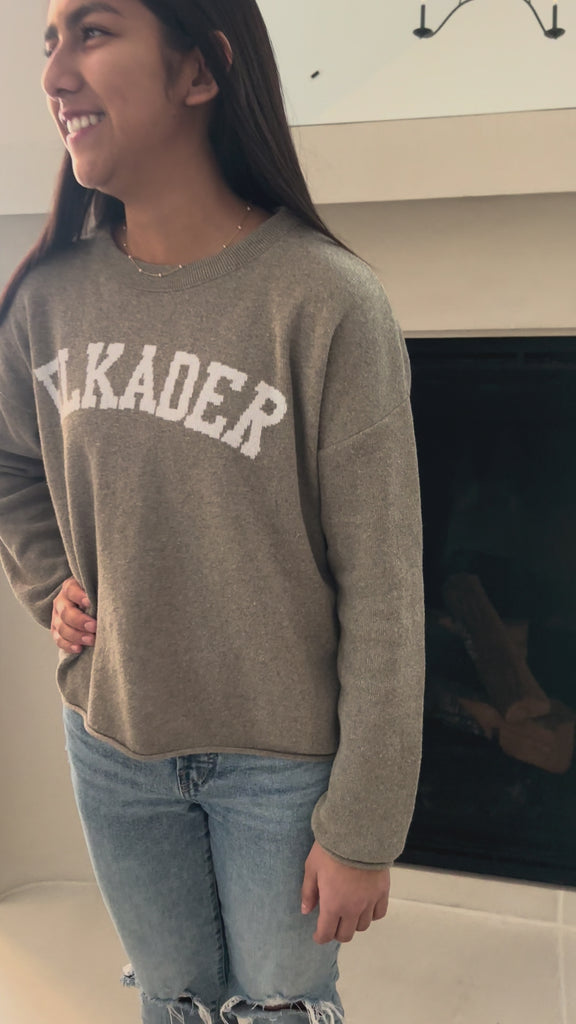 taupe and white knit sweater with Elkader