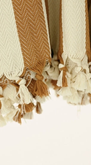 caramel brown and cream striped turkish blanket for the bed with tassels