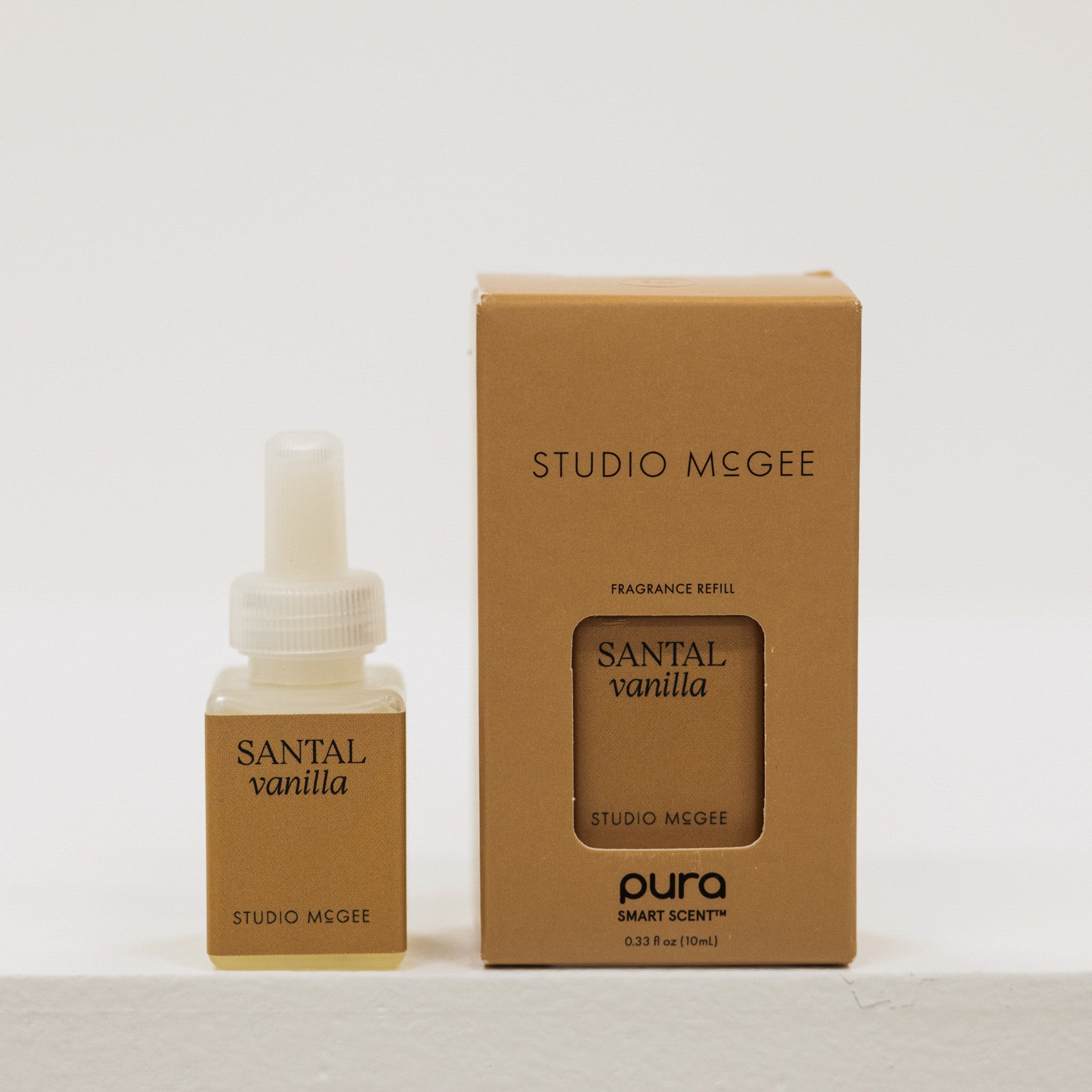 Studio McGee Santal Vanilla fragrance refill bottle and packaging on a white background
