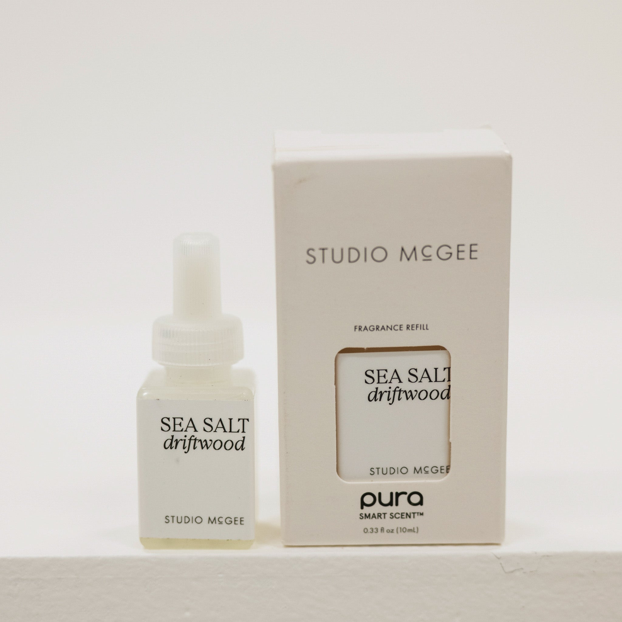 Studio McGee Sea Salt Driftwood fragrance bottle and packaging on a white background