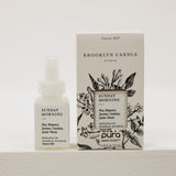 Brooklyn Candle Studio pura and packaging on a light background