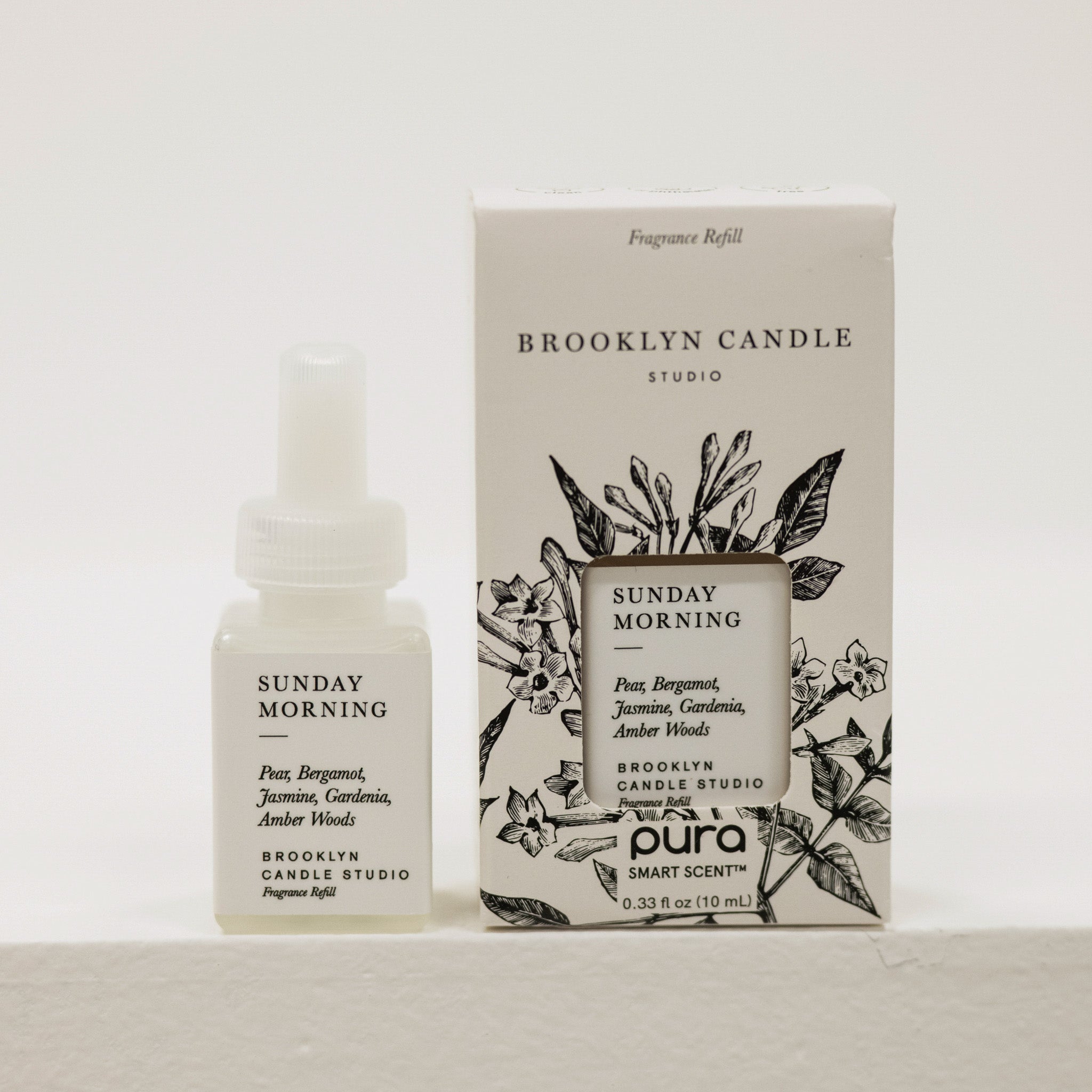 Brooklyn Candle Studio pura and packaging on a light background