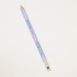 Lavender pencil with gold cap on a light gray background