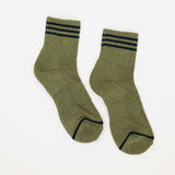 short crew socks in a sage green color with dark stripes