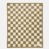 A rectangular woven blanket with a classic checkerboard pattern in olive green and cream, featuring a small white brand label in the bottom right corner.