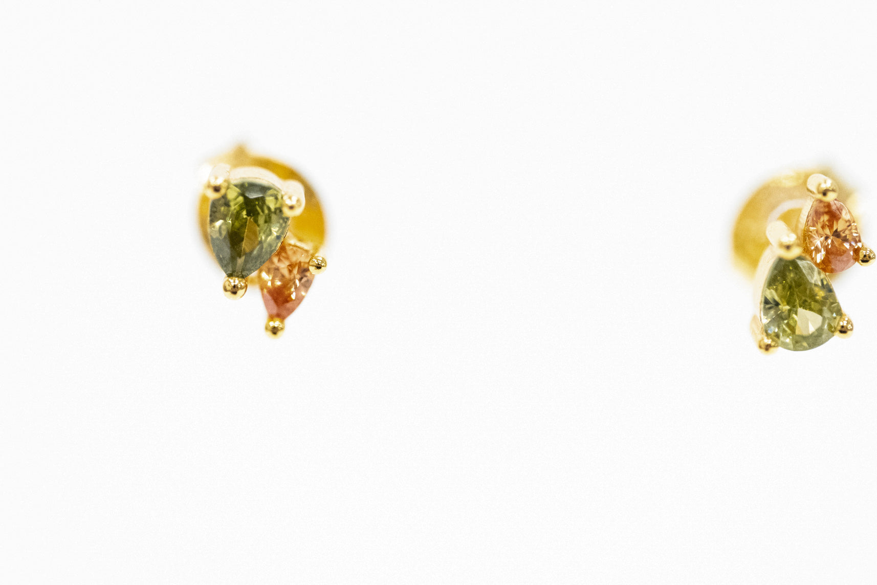 stud earrings with a pair of CZ stones in sage and champagne