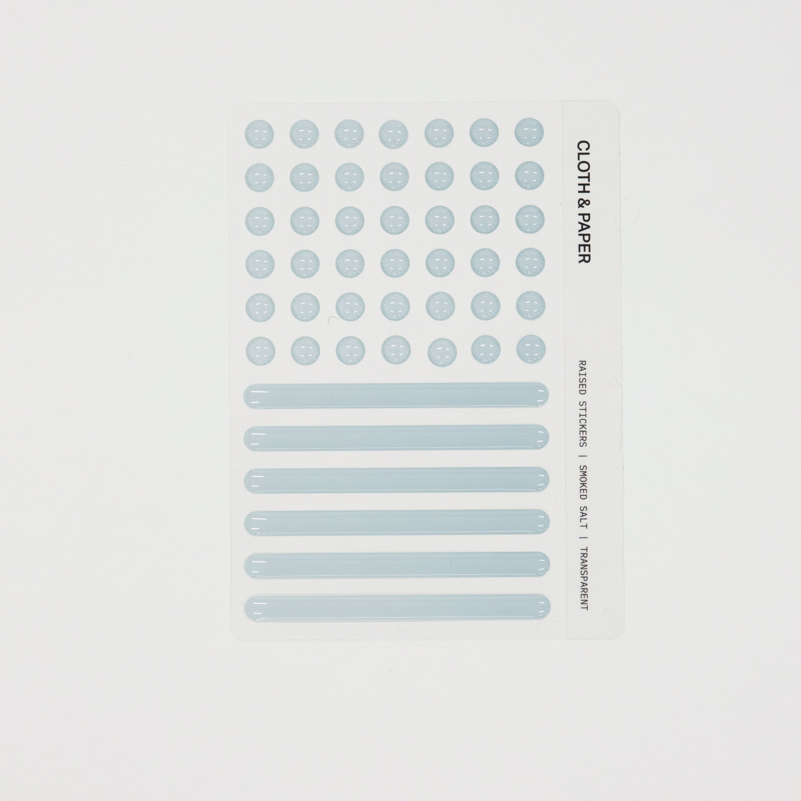 Set of light blue circular and rectangular stickers on a white background with 'Cloth & Paper' branding.