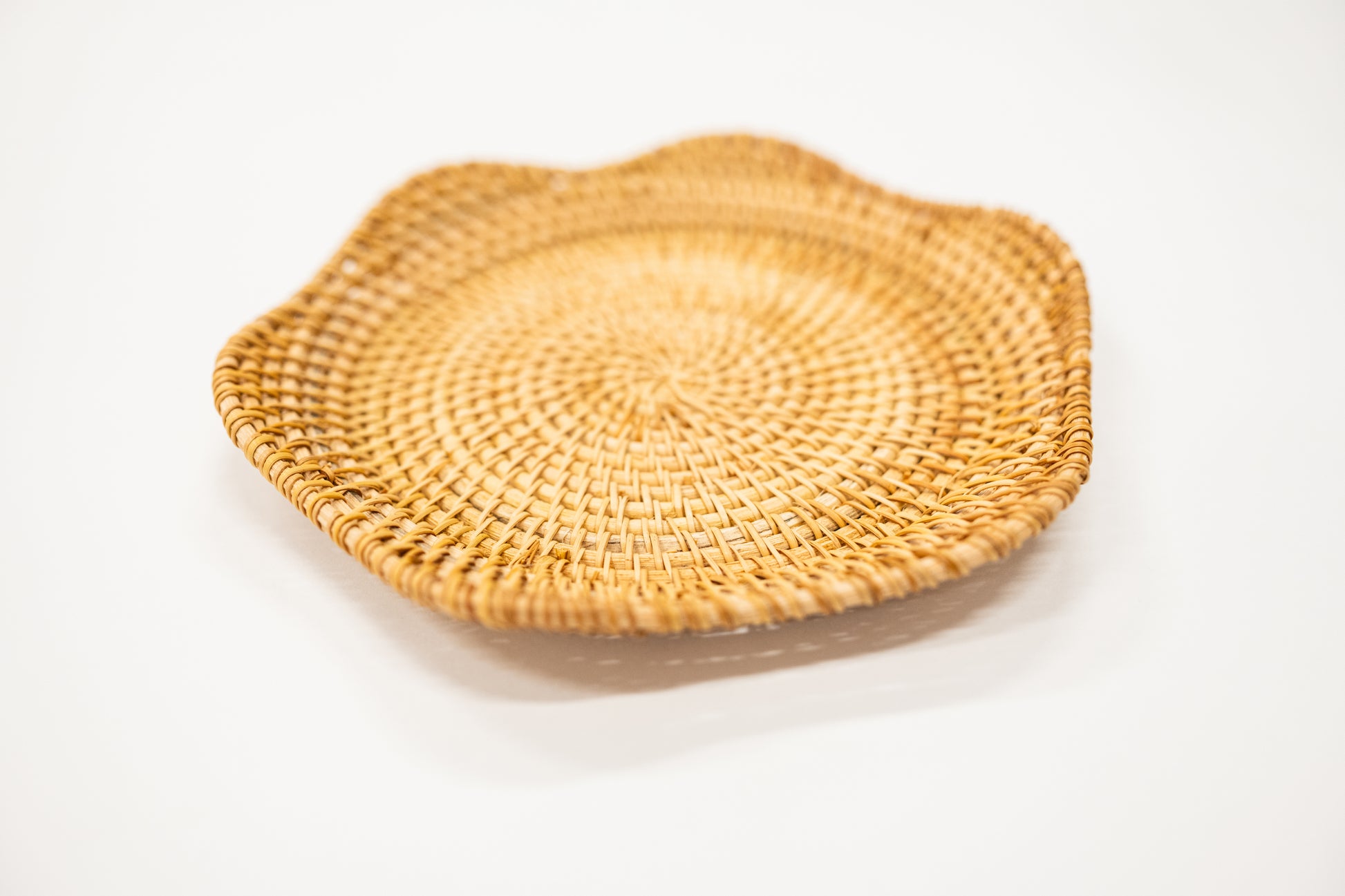 scalloped edge woven rattan tray for decorating
