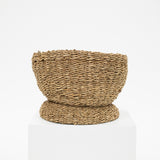 seagrass basket bowl with a raised base.