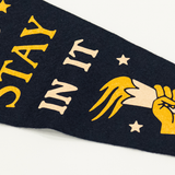 navy wall pennant with phrase "seize the moment and stay in it".