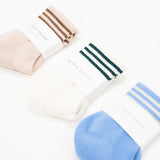 set of three girlfriend socks in light pink, cream and light blue