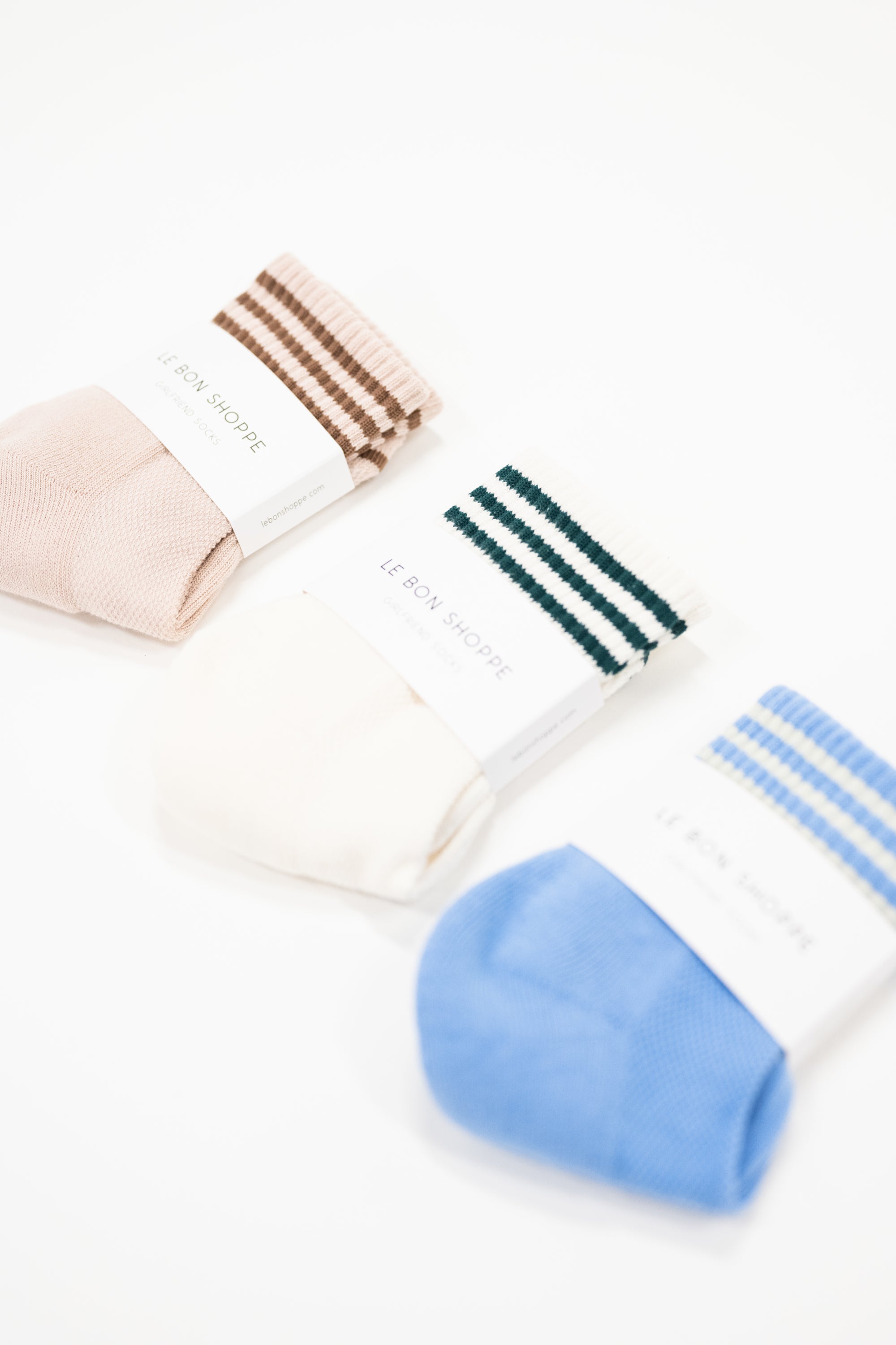 set of three girlfriend socks in light pink, cream and light blue