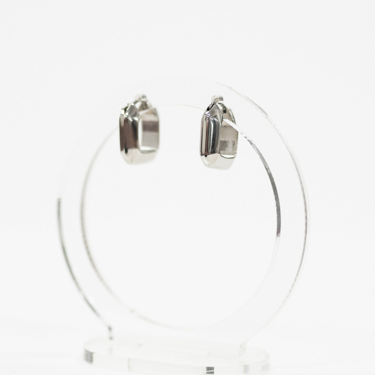 silver square shaped earring huggie side view with white background