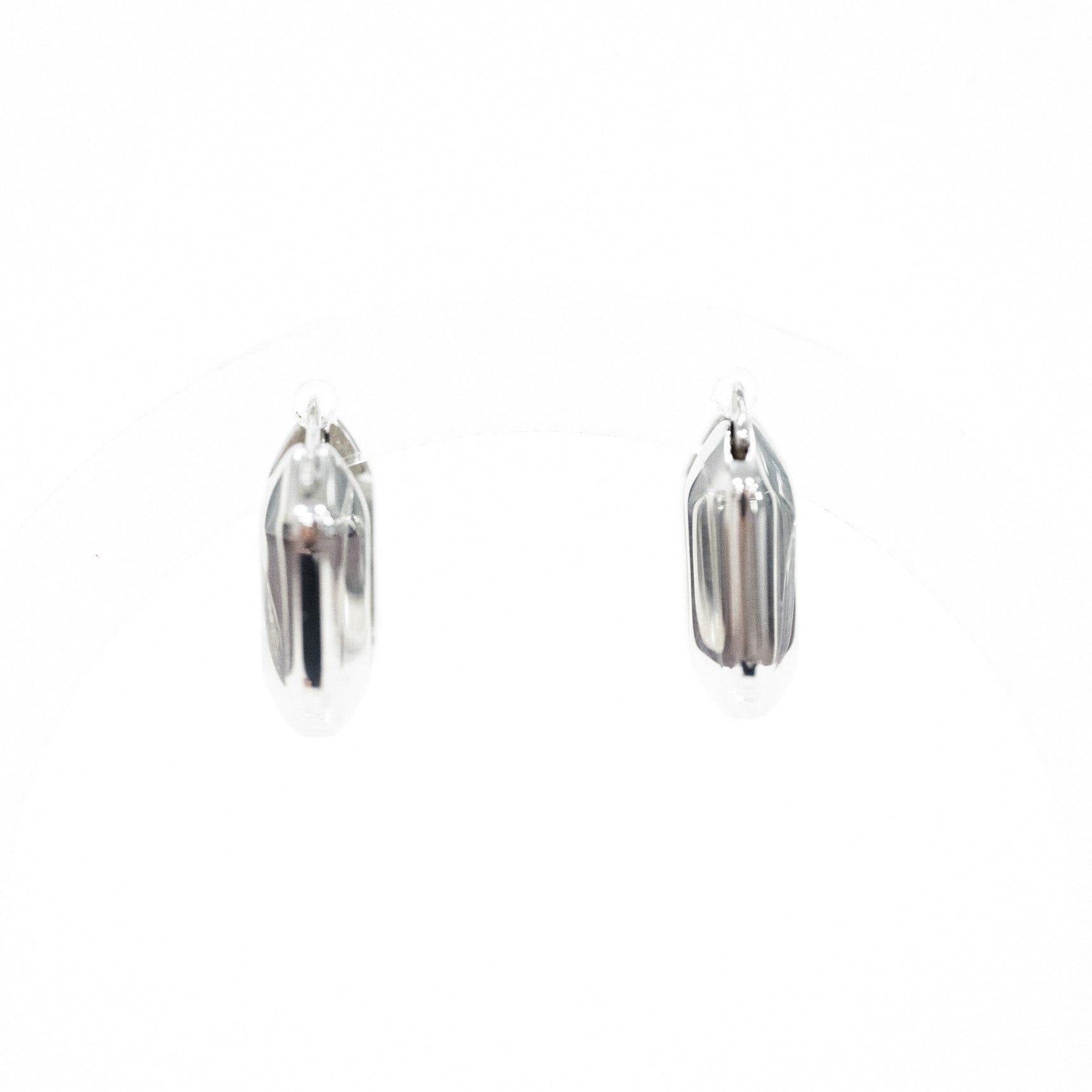 silver square shaped earring huggie side view with white background
