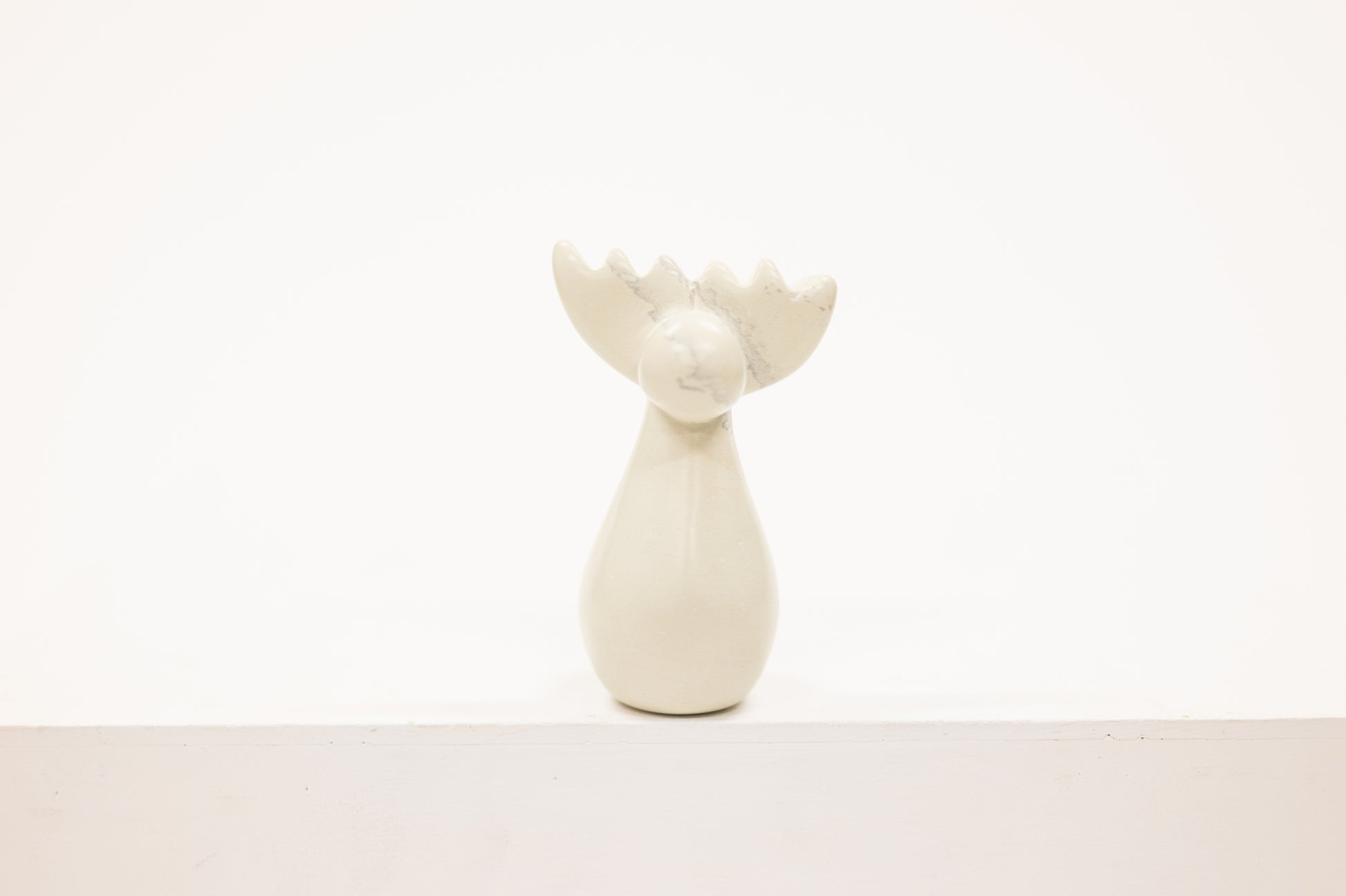 reindeer figurine carved from white soapstone
