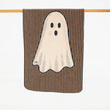a microfiber kitchen towel with black and orange striped background a friendly ghost.