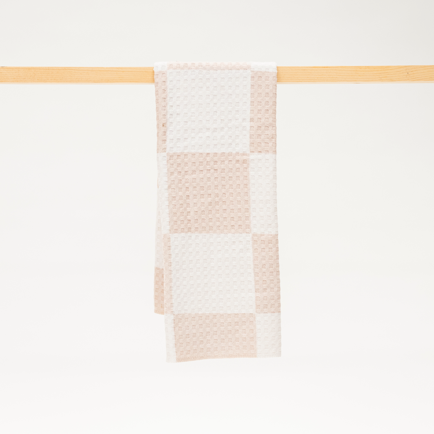 Tan and white checkerboard microfiber kitchen towel