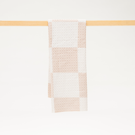 Tan and white checkerboard microfiber kitchen towel