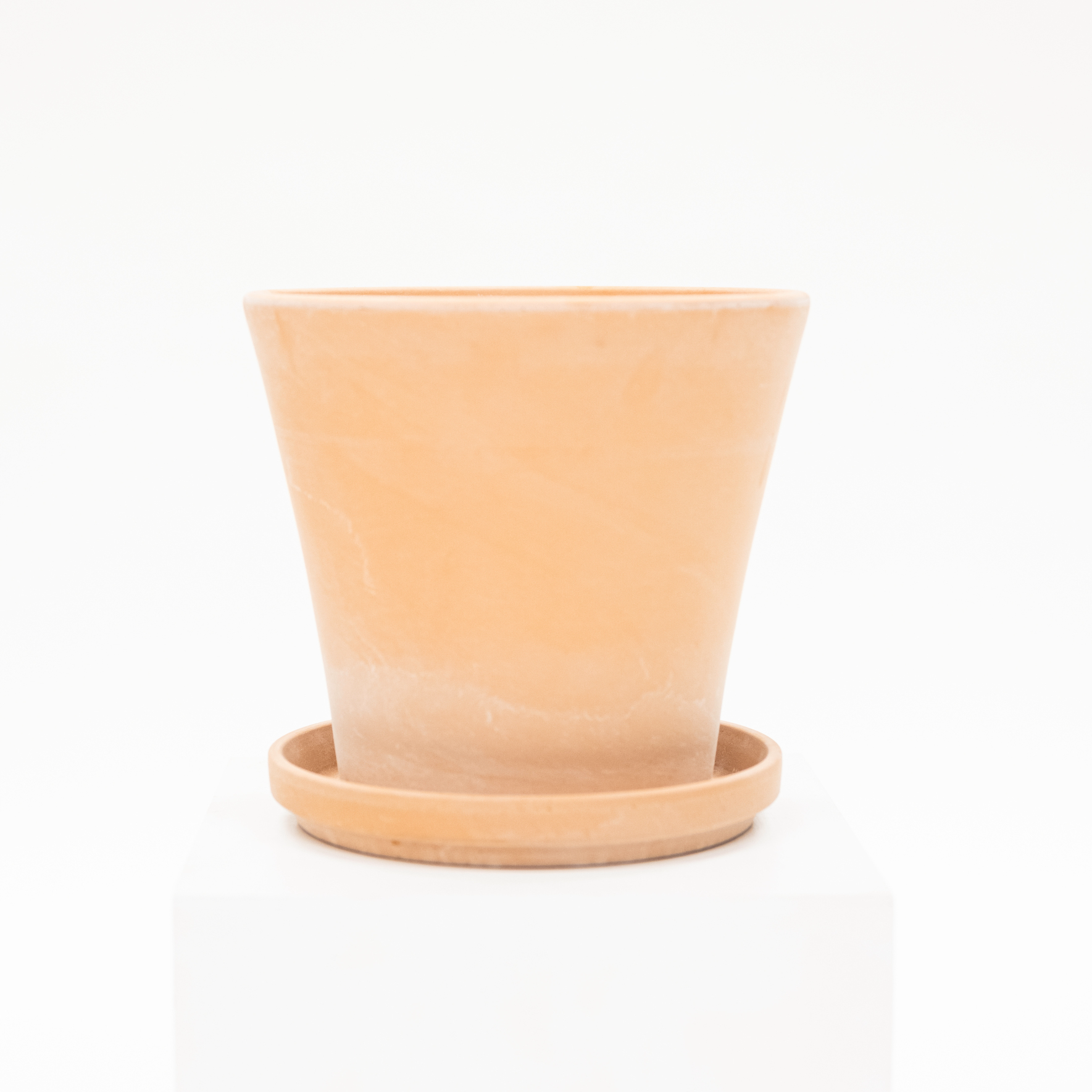 tapered shaped terracotta planter with drainage and saucer