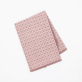A folded taupe brown microfiber dishcloth featuring a textured basketweave pattern, shown on a clean white background.