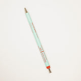Mint green pen with red accents on a white background
