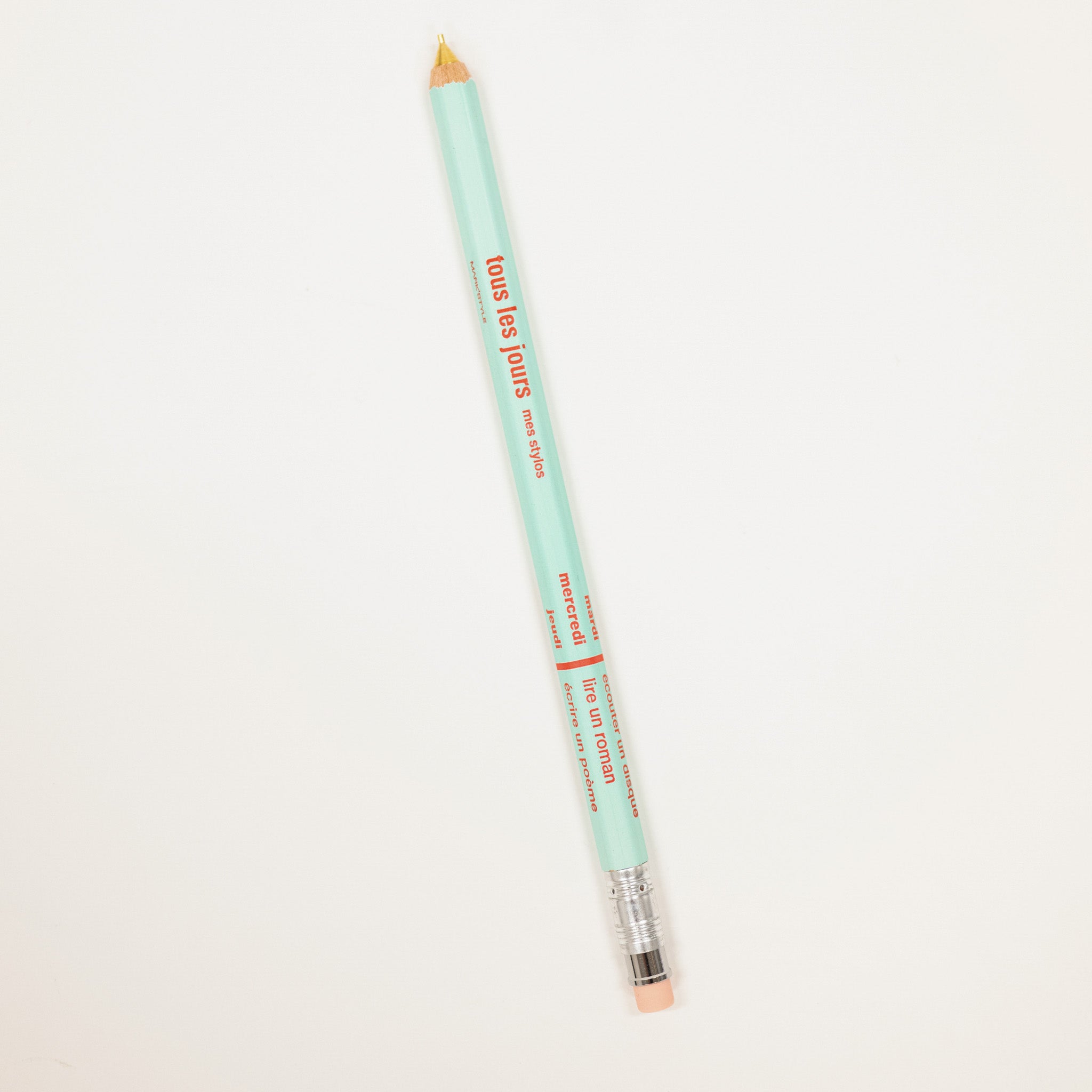 Mint green pencil with brand name on a white background
