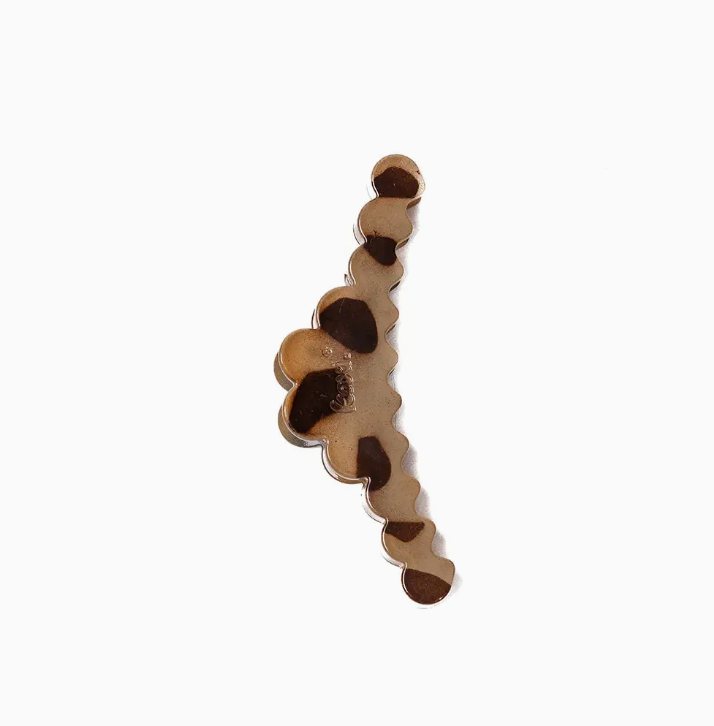 A single scalloped earring with a layered, wavy design in shades of brown and beige, shown against a plain white background.