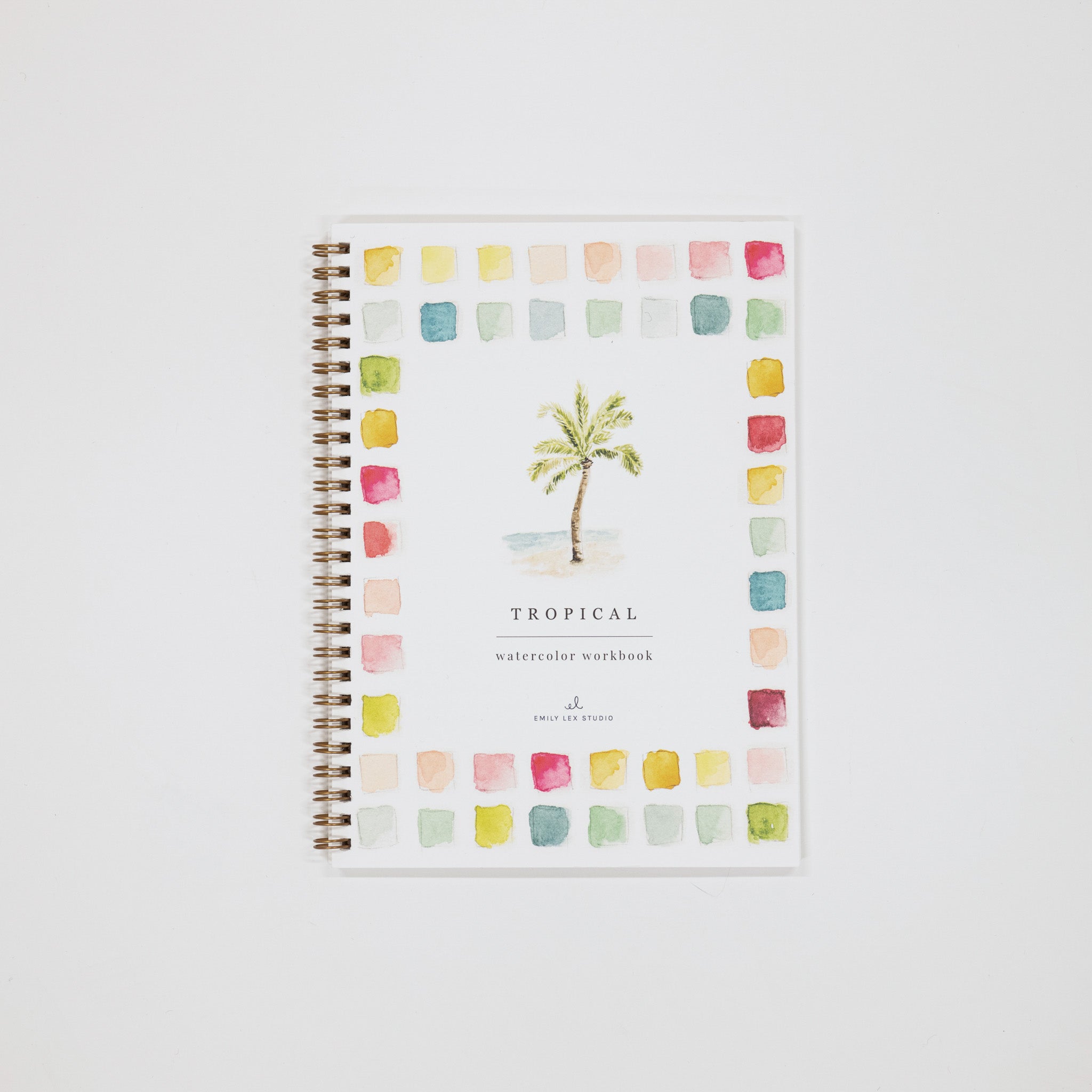 Workbook with palm tree design and colorful square pattern on a white background