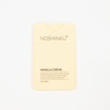 Noshinku Vanilla Crème hand sanitizer in a pale yellow rectangular bottle with rounded corners, shown on a clean white background.