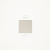 Packaging of sticky notes with a light gray color swatch on a white background