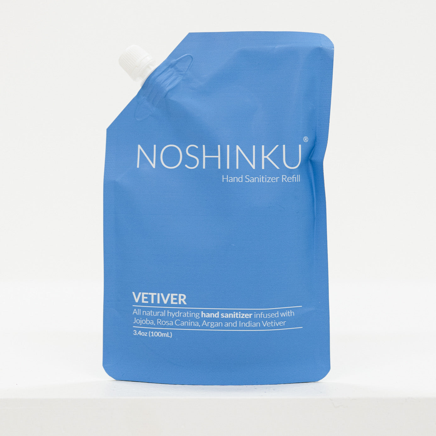 Blue Noshinku hand sanitizer refill pouch on a white background