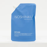 Blue Noshinku hand sanitizer refill pouch on a white background