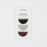 Three mini magnetic bookmarks on a 'Cloth & Paper' branded card against a white background