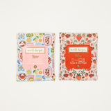 Two packages of 'well-kept' screen and lens wipes with colorful designs on a white background.