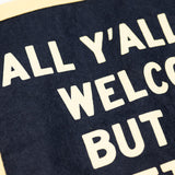 Text sign reading on a navy background.