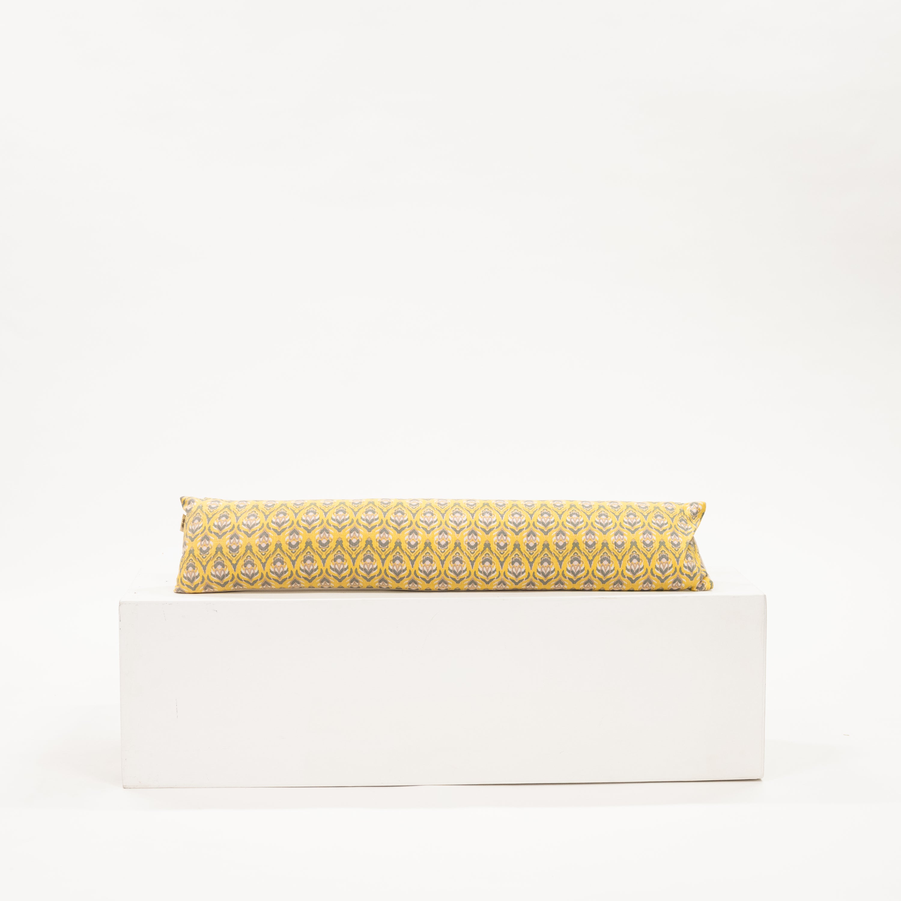 thin lumbar pillow with yellow iris repeating pattern